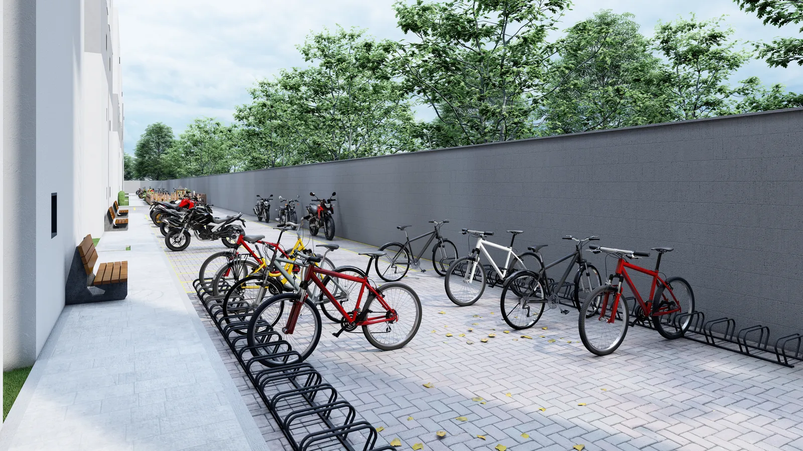 Bicicletário do Bravize Eusébio, com suportes e bicicletas alinhadas junto ao muro