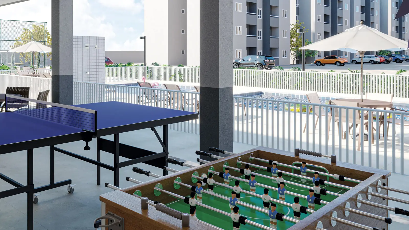 Salão de jogos do Gran Village Eusébio III, com mesa de tênis de mesa e pebolim