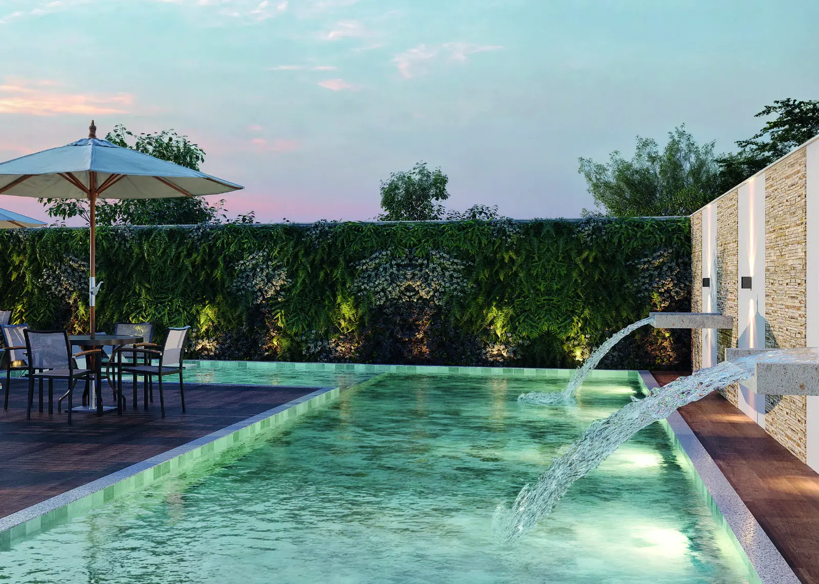 Piscina do Jóquei Condomínio Clube ao entardecer, com cascata, deck, jardim vertical e mesas com guarda-sol