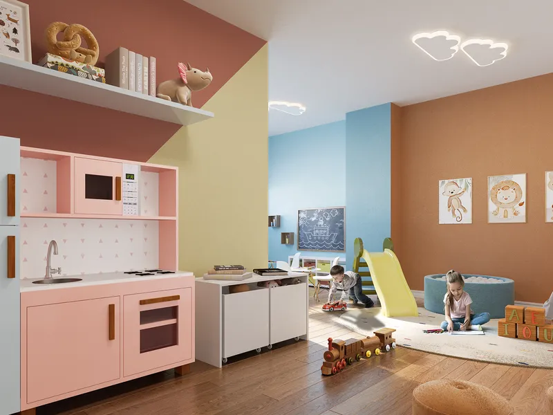 Brinquedoteca do Laguna Ville, com cozinha de brinquedo, cabana e prateleiras de livros