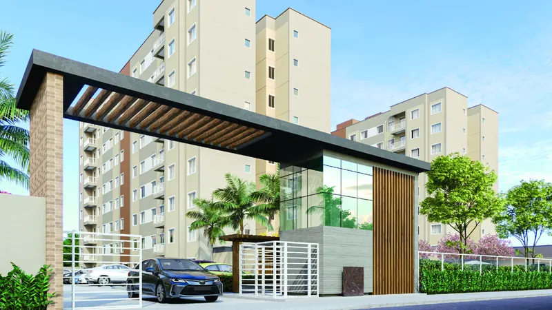 Entrada do Stay One, no Mondubim, com a portaria e a fachada das torres