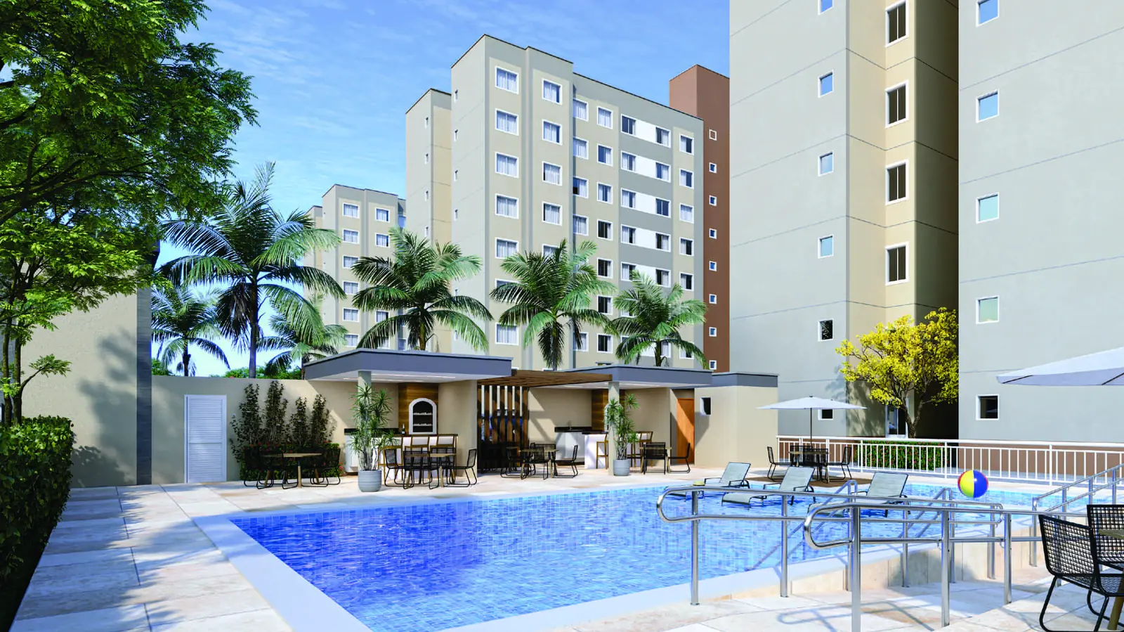 Piscina adulto e infantil do Stay One, com deck de madeira, quiosque com churrasqueiras e as torres ao fundo
