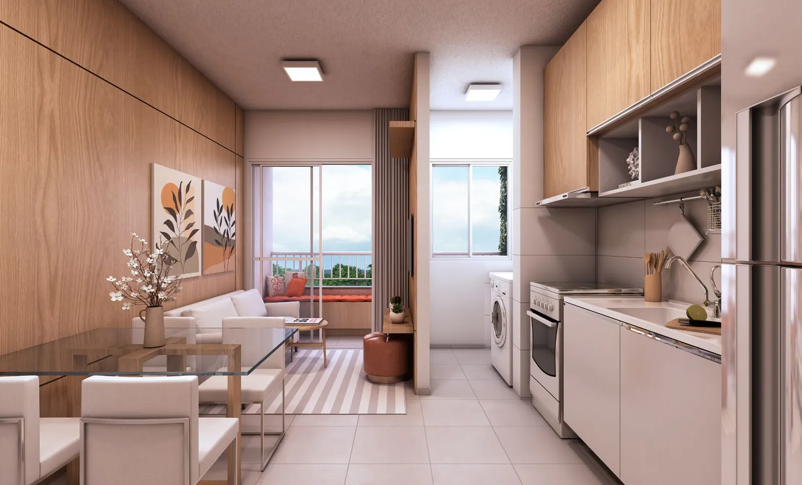 Sala e cozinha integradas de um apartamento do Torre do Mar, decoradas, com mesa, armários e área de serviço ao fundo