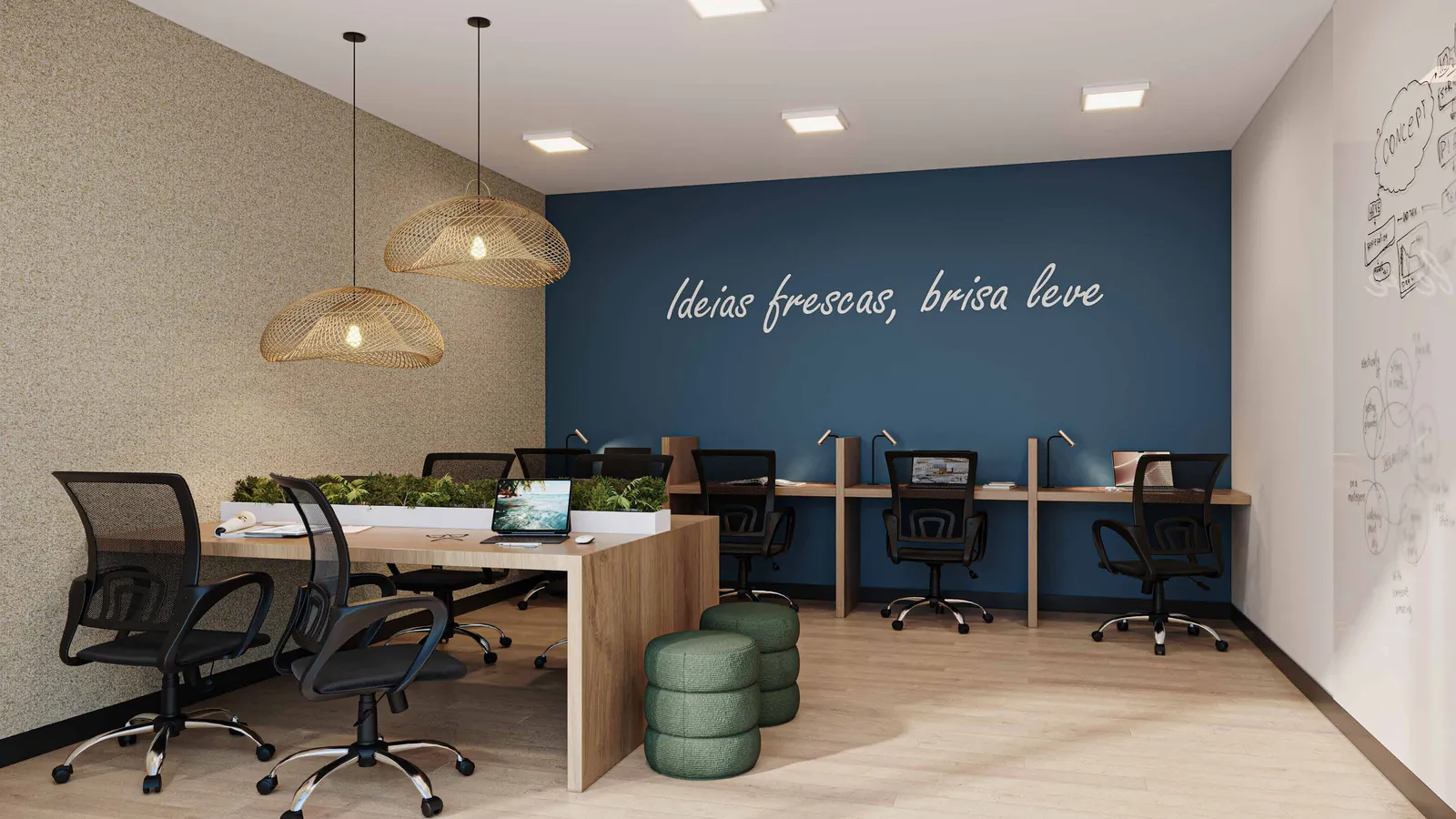 Coworking do Vista Coqueiral, com estações de trabalho, cadeiras e luminárias pendentes
