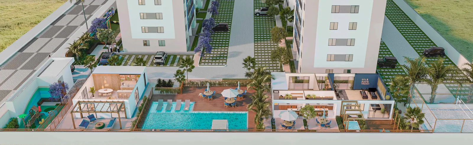 Vista aérea da área de lazer do Vista Coqueiral, com a piscina, o solarium, o salão de festas e a quadra de beach tennis voltados para a praia