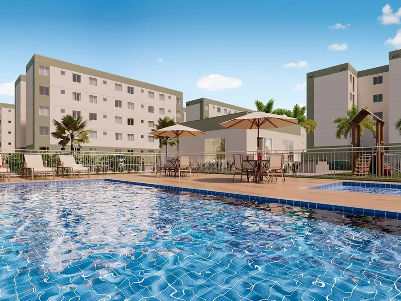 Piscina adulto e infantil do Vitória Jasmim, com deck, espreguiçadeiras e as torres ao fundo